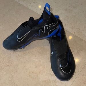 Nike youth size 4.5 Black and Blue Soccer Cleats